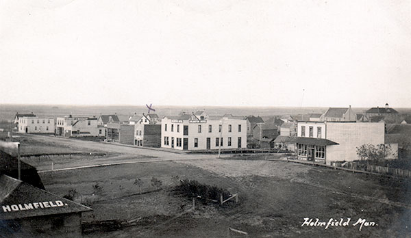 View of the Messner store at right in an early 20th century panoramic view of Holmfield