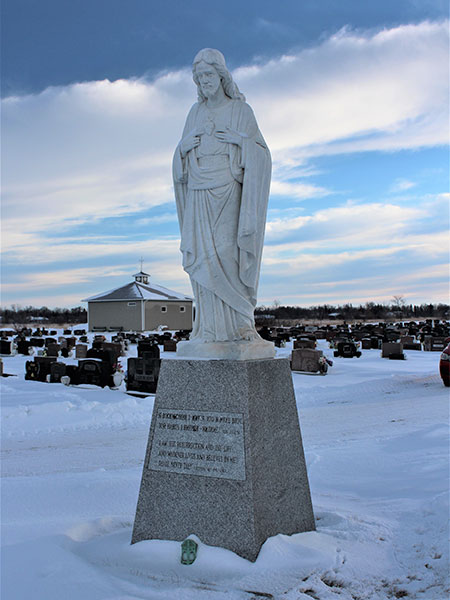 Sacred Heart statue in the Holy Family Cemetery