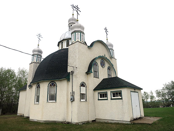 Holy Ghost Ukrainian Orthodox Church with its cemetery in the background