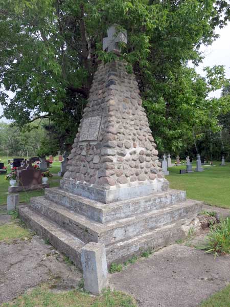 Fieldstone cairn, erected in 1943, commemorating construction of the first Ukrainian Catholic Church in Manitoba, in 1898, at this site