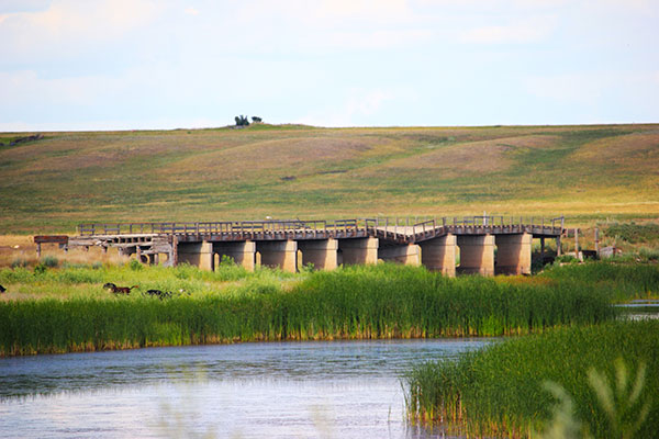 Concrete beam bridge over Souris River