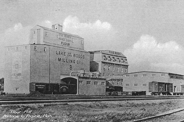Postcard view of Lake of the Woods mill at Portage la Prairie