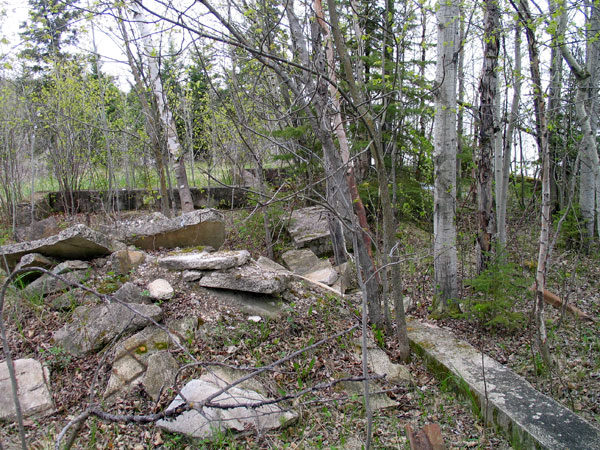Remains of a building foundation at the former camp site