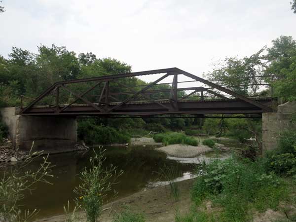 Steel pony truss bridge over the Whitemud River