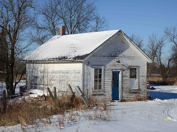 Steam Locomotive No. 30 in front of the Pine Falls Paper Mill