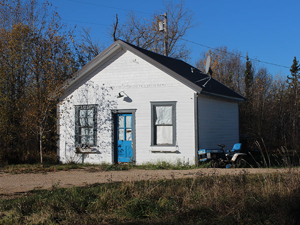 Steam Locomotive No. 30 in front of the Pine Falls Paper Mill