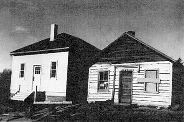 Lumber school built in 1946 by the grandsons of Andrew Monkman who had built the adjacent log school with William Monkman in 1918