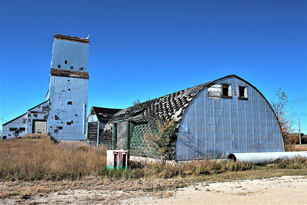 The former Manitoba Pool grain elevator and outbuildings at Lowe Farm