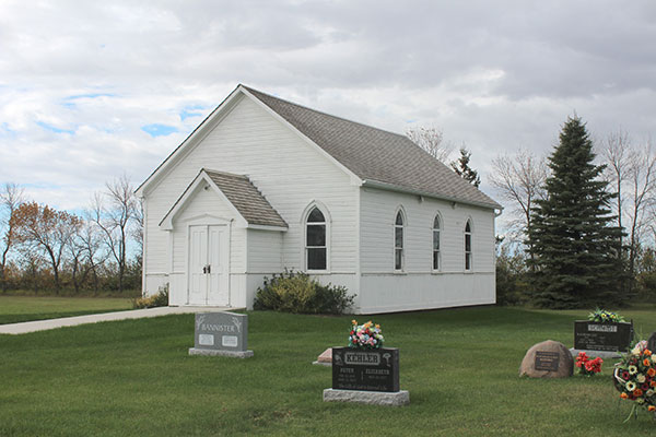 The former Archibald United Church building at the Manitou Cemetery