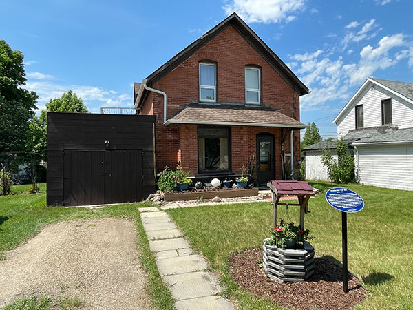 May House with commemorative plaque