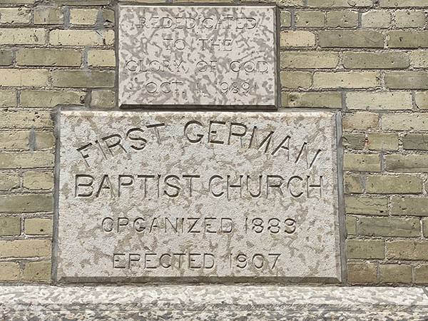 Plaques on the exterior of McDermot Avenue Baptist Church