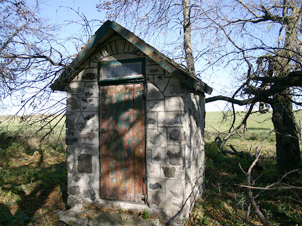 McLaren stone outhouse