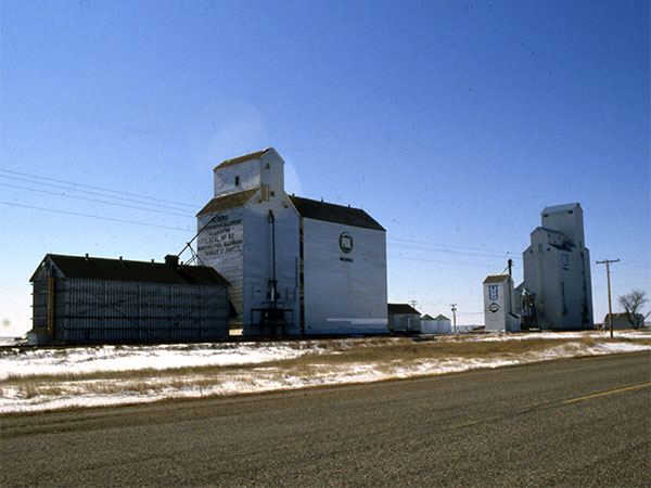 Manitoba Pool grain elevator with the United Grain Growers grain elevator at Medora