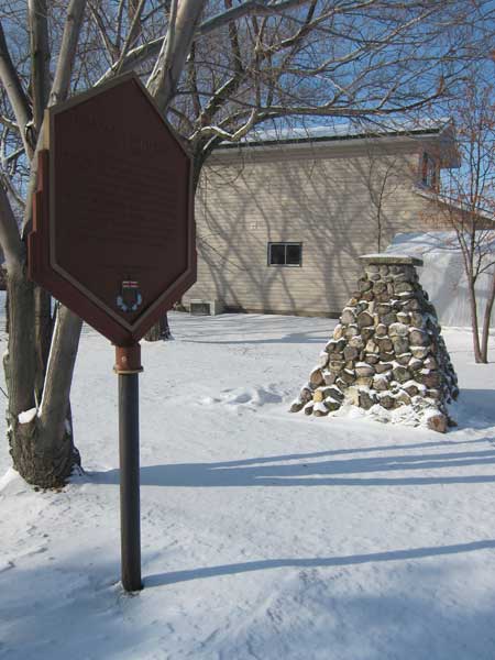 Mennonite West Reserve plaque and Rosenfeld monument
