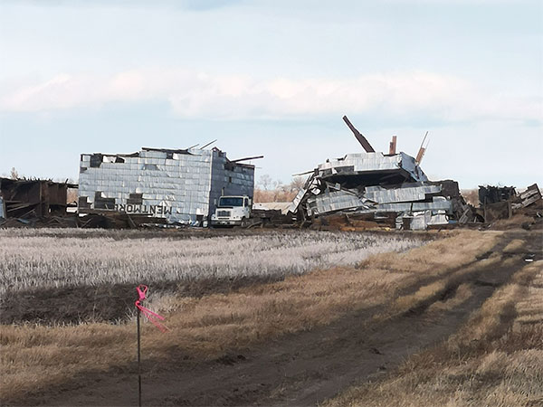 Former Manitoba Pool grain elevator at Mentmore being demolished