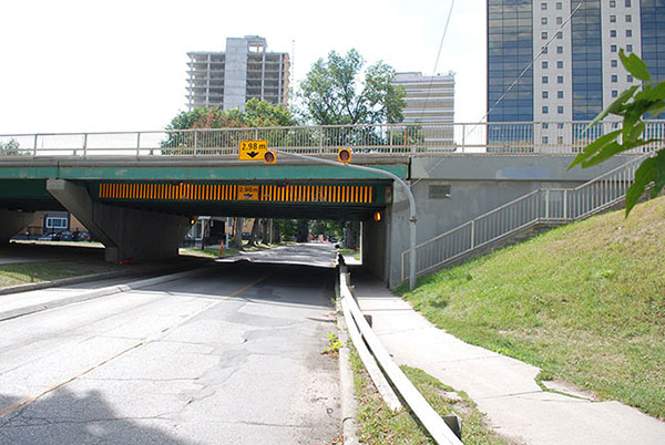 Midtown Bridge with commemorative plaque along pedestrian access stairway, located at N49.88524, W97.13870
