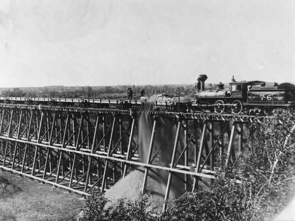 Covering the Millford Railway Bridge with fill