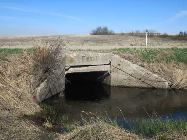Concrete beam bridge over the Arrow River
