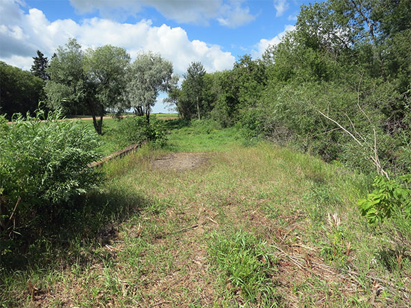 Concrete beam bridge over Minitonas Creek