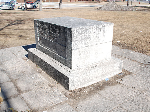 Former monument base beside the Manitoba Metis Federation Building