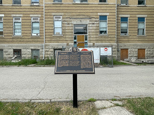 Commemorative plaque at the former Portage la Prairie Indian Residential School building