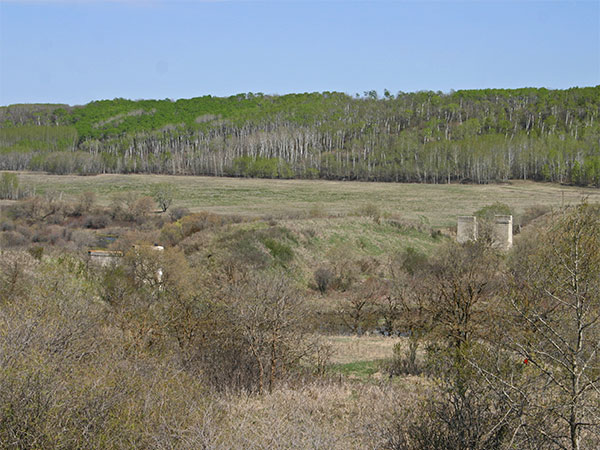 Remains of the CNR Rapid City Subdivision Bridge near Rapid City at left and the concrete pillars that allowed the line to cross the CPR Rapid City Subdivision at right