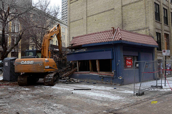 The former Reliable Service Station undergoing demolition