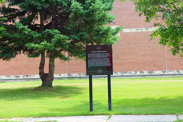 Roland schools commemorative sign