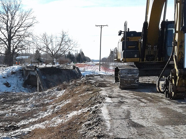 Demolition of concrete beam bridge no. 1000 over Roseisle Creek