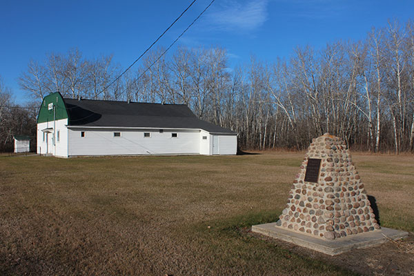 Senkiw Community Hall with Pioneers Monument