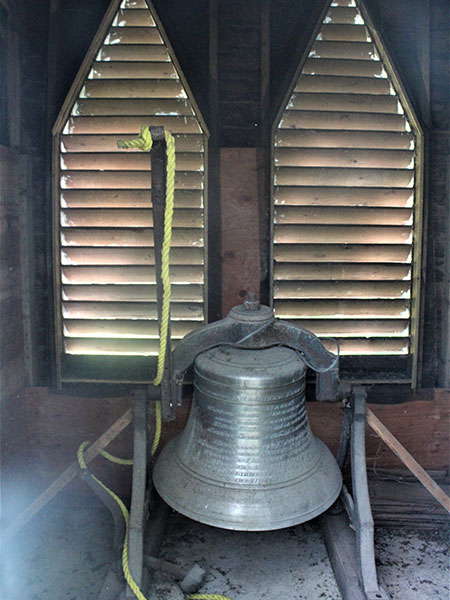 Inscribed bell inside the steeple