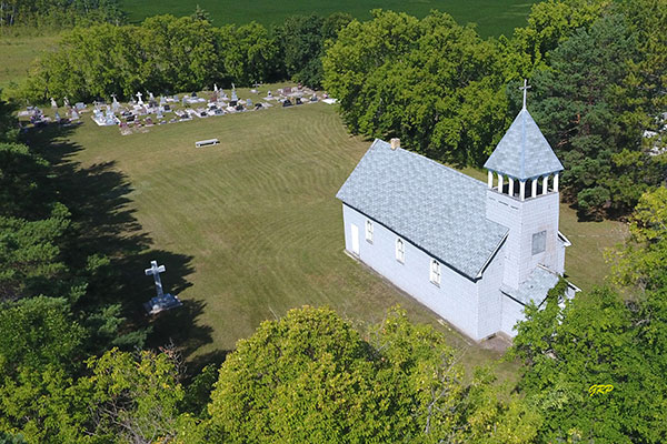 Aerial view of the St. John the Baptist Roman Catholic Church and Cemetery at Hadashville