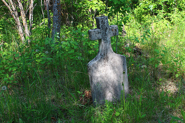 Solitary tombstone near the St. Mary Protectice Cemetery