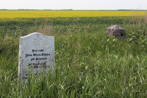 Cemetery marker and unidentified monument near the St. Peter’s School commemorative sign