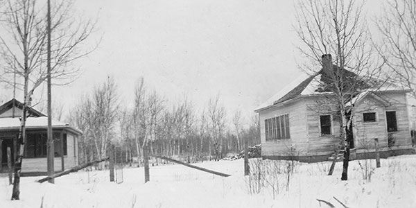 Sundown School at right with teacherage at left