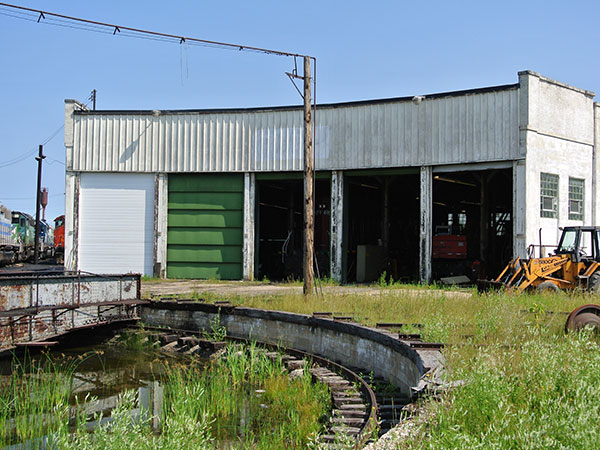 Railway roundhouse with engine turntable in the foreground