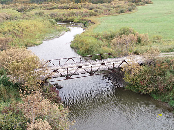 Aerial view of Thompson steel pony truss bridge over Birdtail Creek