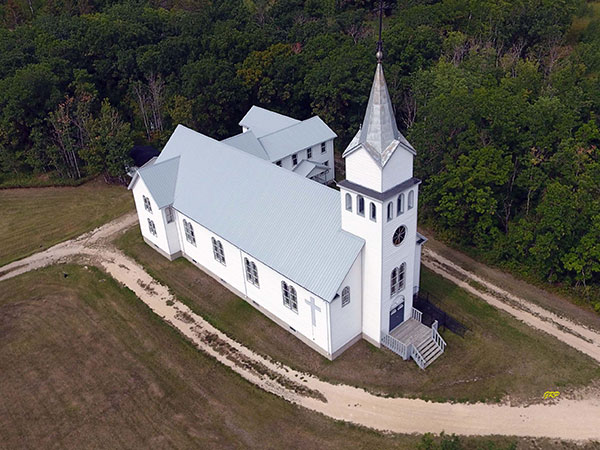 Aerial view of Notre Dame Roman Catholic Church at Toutes Aides
