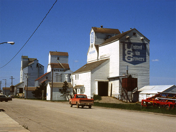 The Paterson grain elevator at Treherne with the UGG in foreground and Manitoba Pool elevator in background
