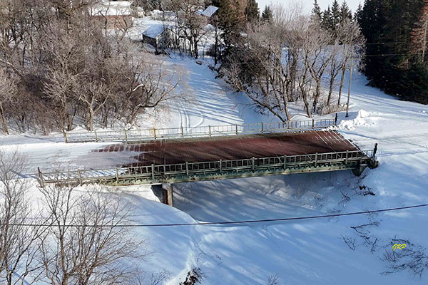 Aerial view of steel beam bridge over the Vermillion River
