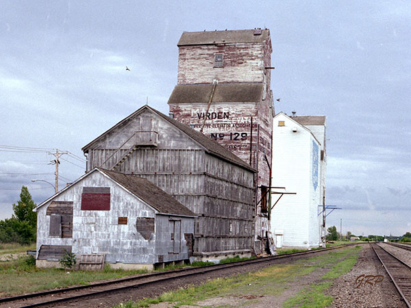 The former Manitoba Pool Elevator at Virden with the United Grain Growers grain elevator in the background