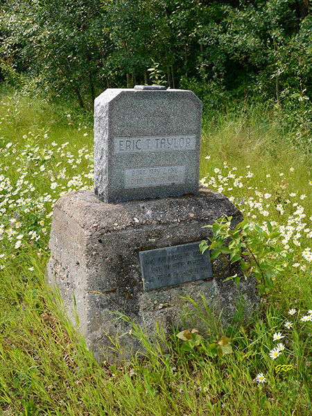 Taylor memorial beside the Wabowden Historical Museum