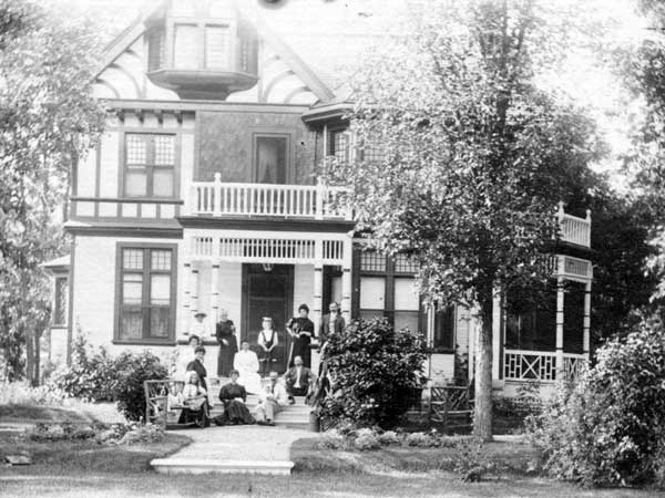 Members of the Bain family beside the Bain House