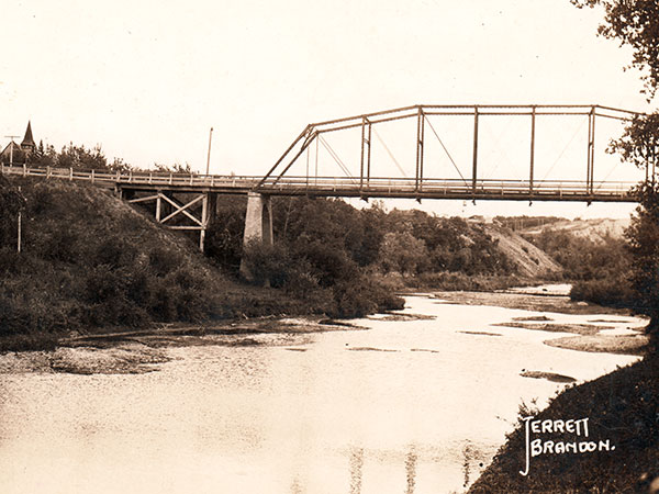 Postcard view of steel through truss bridge #727 over the Souris River