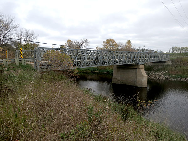 The replacement steel pony truss bridge over the Whitemouth River
