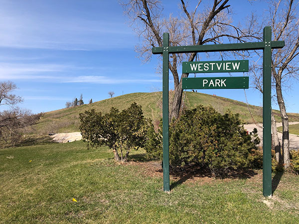 Entrance to Westview Park with “Garbage Hill” in the background