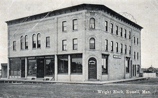Postcard view of the former Wright Block, built in 1906, before it was destroyed by fire in 1916
