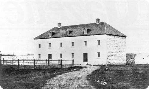 Warehouse building at Lower Fort Garry, 1858. Between 1871 and 1877, it served as Manitoba's first penitentiary with Samuel Bedson as warden.
