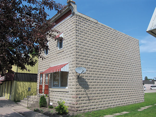 The Bergthaler Church Waisenamt (48 Main Street, Altona) was the local home for a mutual aid association introduced by Mennonites who settled in southern Manitoba in the 1870s. Based on a centuries-old tradition of Mennonites in Prussia and Russia to administer estates and aid widows and orphans, the institution collapsed during the Great Depression of the 1930s. The building has accommodated various functions since then and is now a private residence.