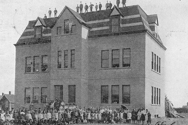 Postcard view of the first Gladstone School
